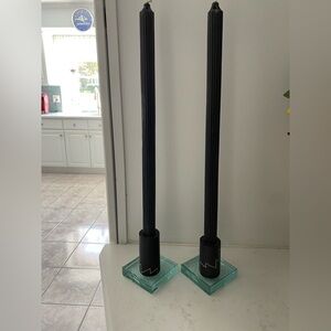 Deliberately contemporary etched glass and black composite candlestick holders